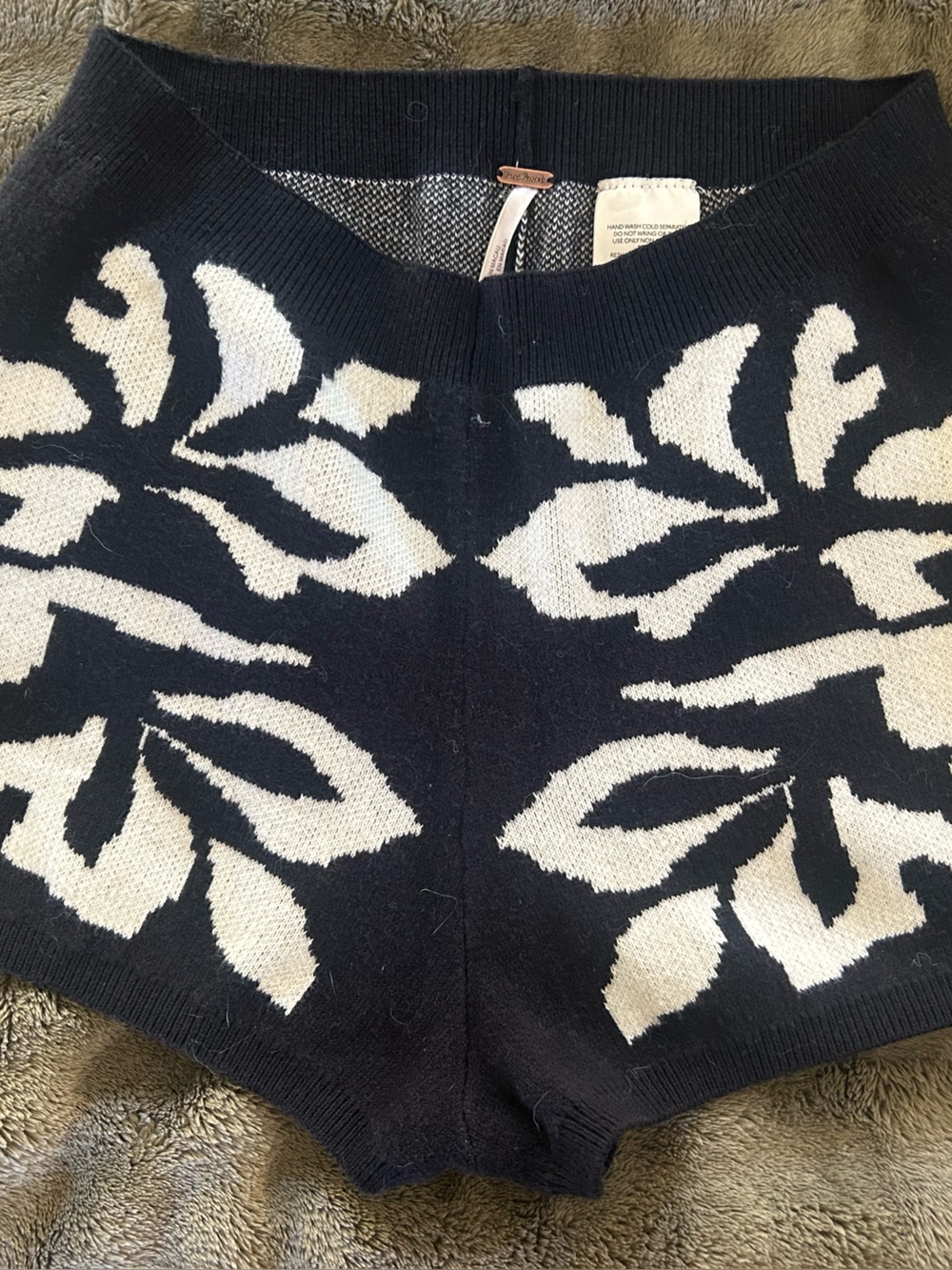 Free People Black Knit Shorts with Cream Floral Pattern